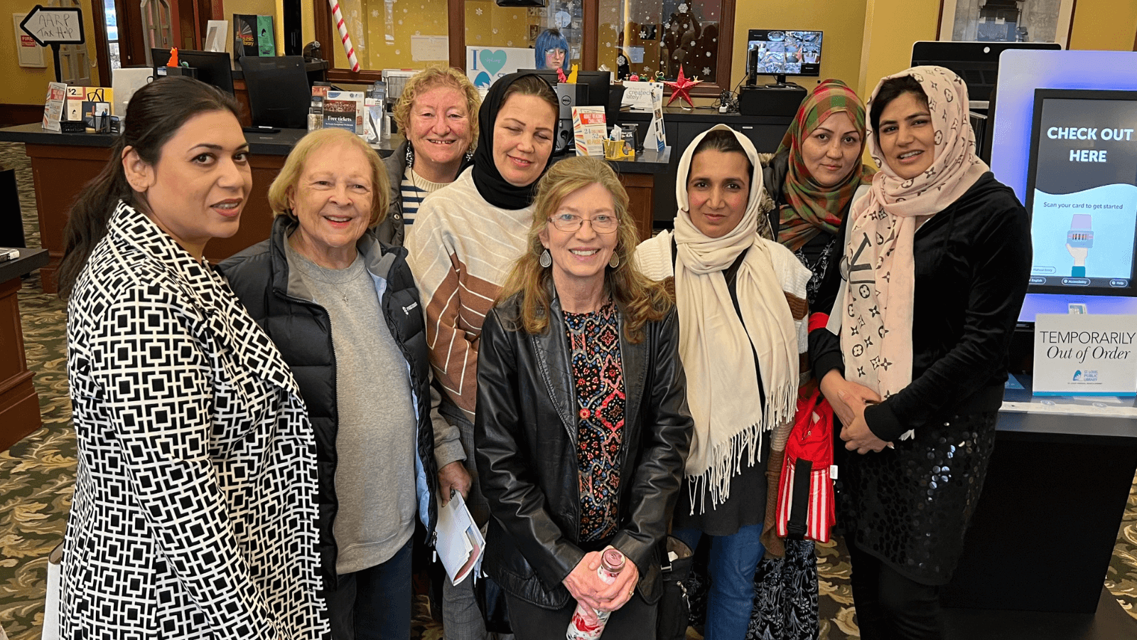 Group of refugee women and volunteers